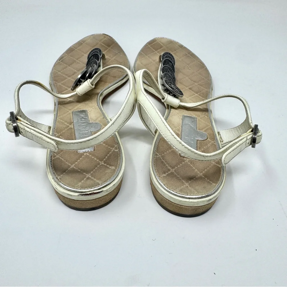 CHANEL White Leather Thong Sandals with Stacked Silver Coin Medallions